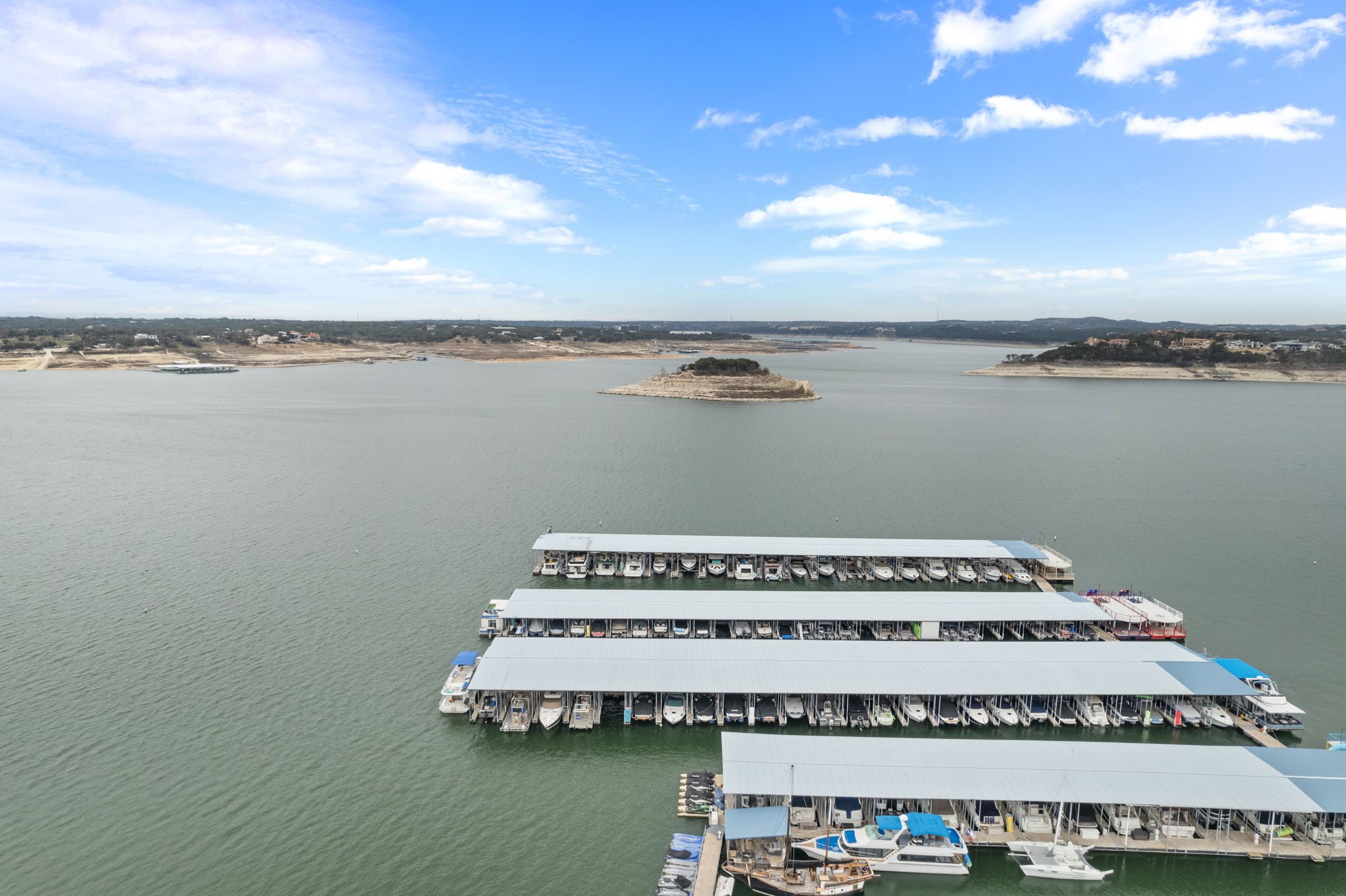 15902 Booth Circle Volente, TX 78641 - Photo 9 of 39 a view of a balcony with a table and chair