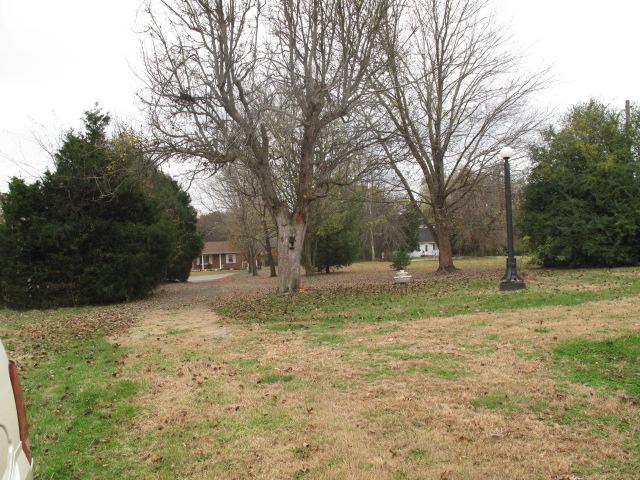 725 Butler Road Portland, TN 37148 - Photo 5 of 14 Looking from the land towards Butler Road. Approximately 1,400 feet of Butler Road frontage with great privacy.