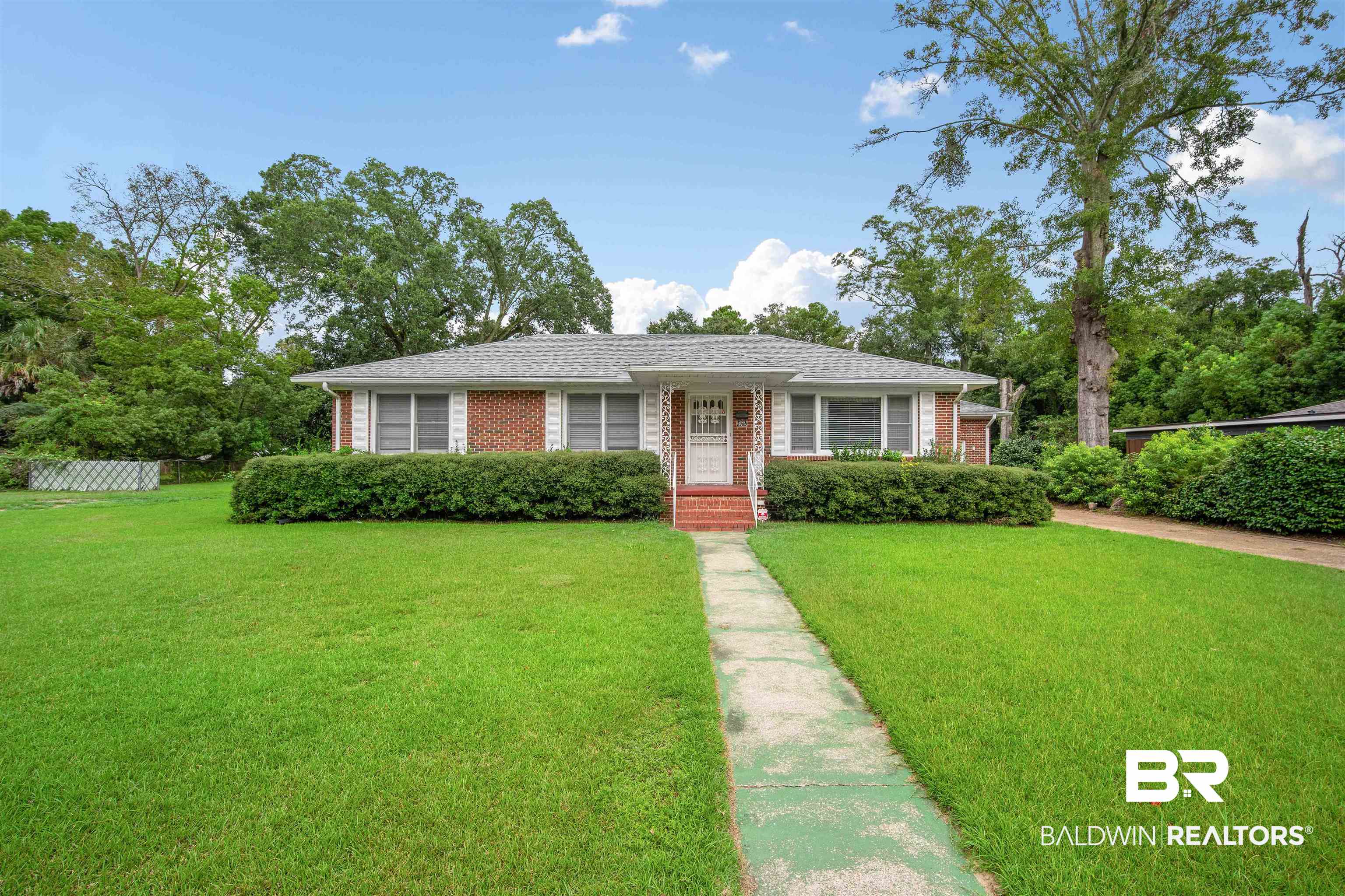 2300 Ellen Drive Mobile, AL 36605 - Photo 1 of 25 View of front of home featuring a front yard