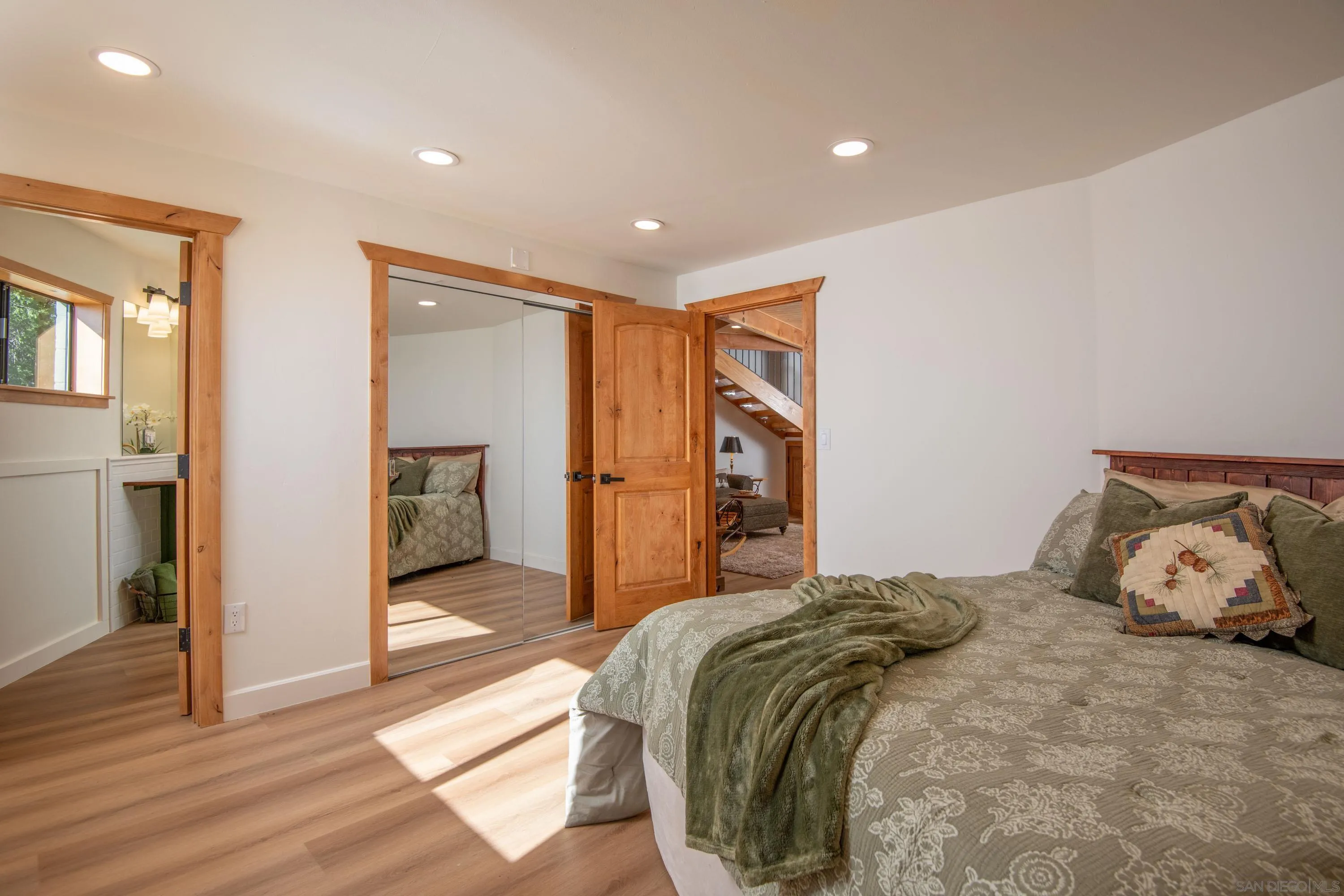 3413 Fern Meadow Road Palomar Mountain, CA 92060 - Photo 18 of 38 a bedroom with a bed and a refrigerator