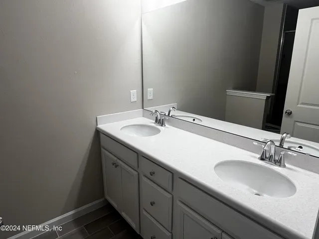 a bathroom with a shower and a toilet