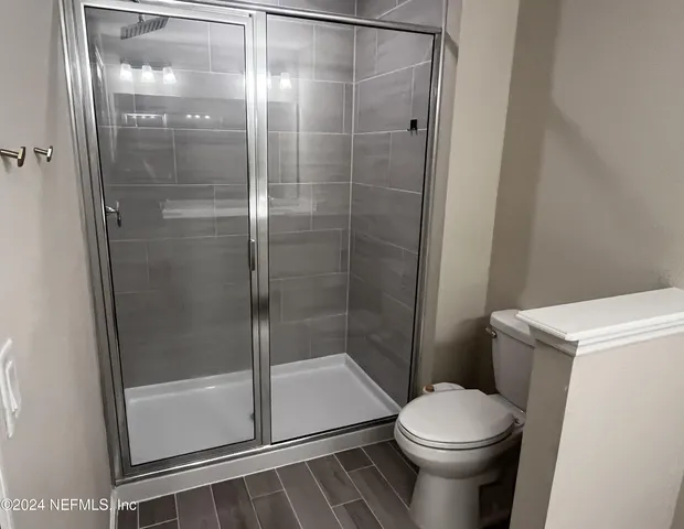 a view of a room with racks on the wall