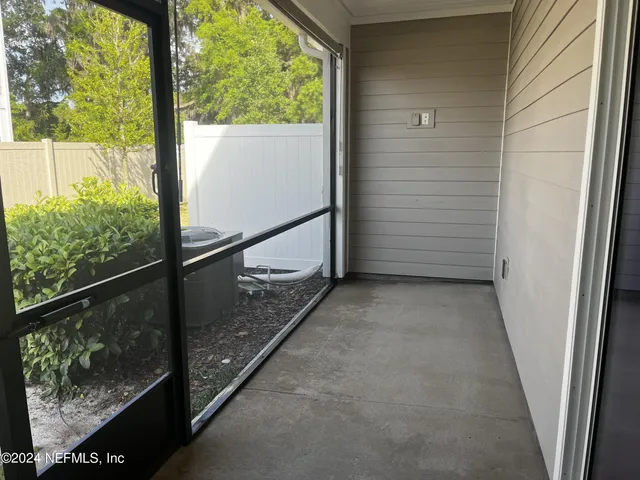 a picture of a bathroom with a shower