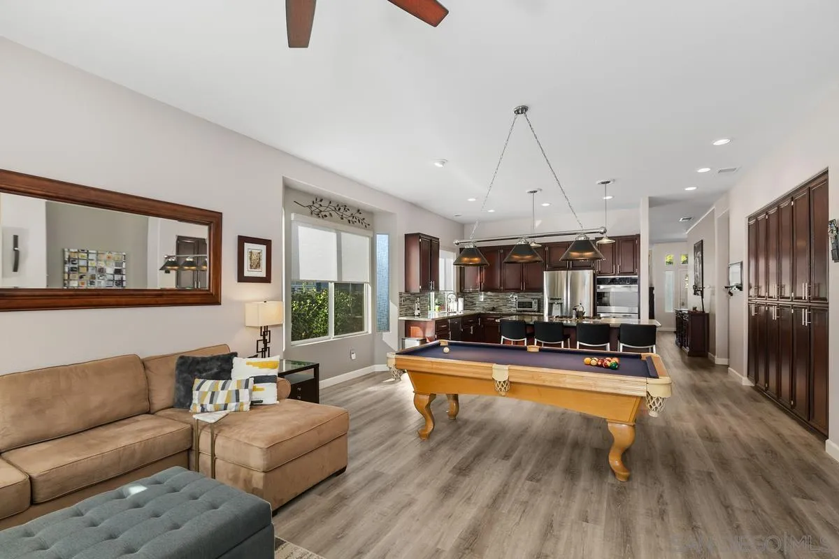 45627 Caminito Olite Temecula, CA 92592 - Photo 12 of 24 a living room with furniture and a flat screen tv