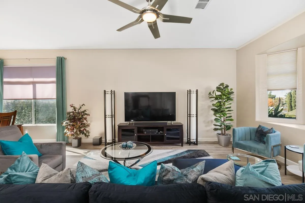 45627 Caminito Olite Temecula, CA 92592 - Photo 5 of 24 a living room with furniture and a flat screen tv