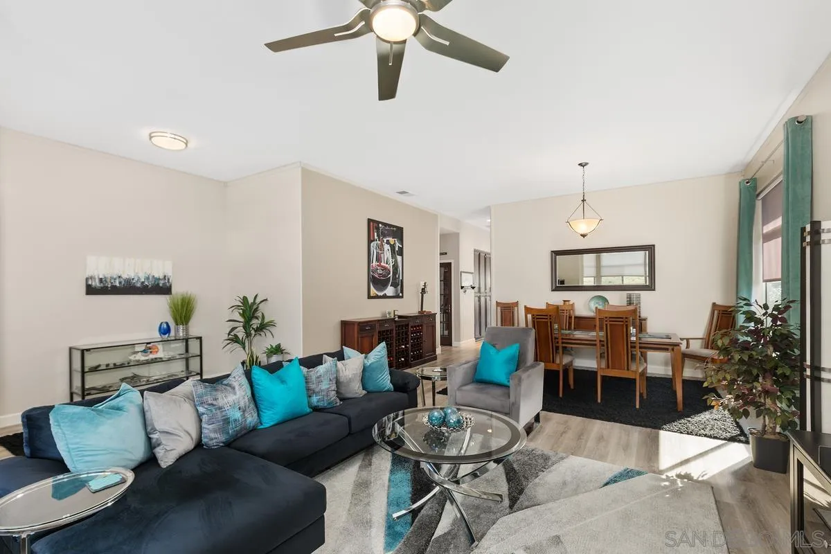 45627 Caminito Olite Temecula, CA 92592 - Photo 7 of 24 a living room with furniture and wooden floor