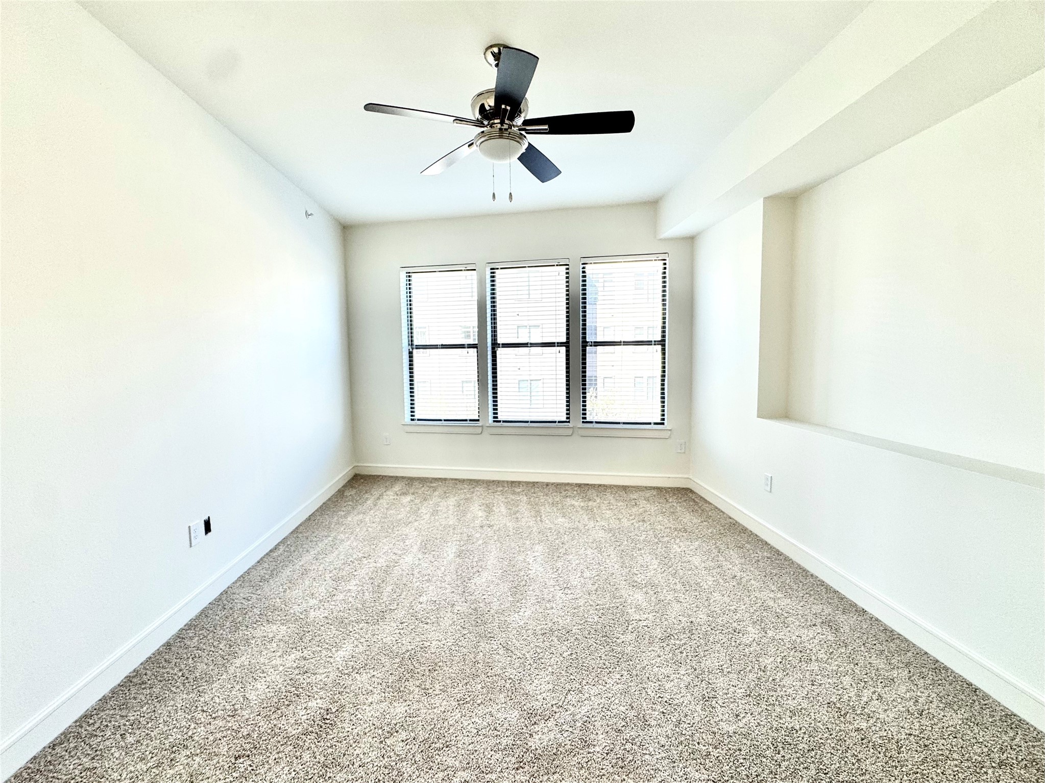 2303 Mid Lane, Unit 228 Houston, TX 77027 - Photo 13 of 30 a view of an empty room and window