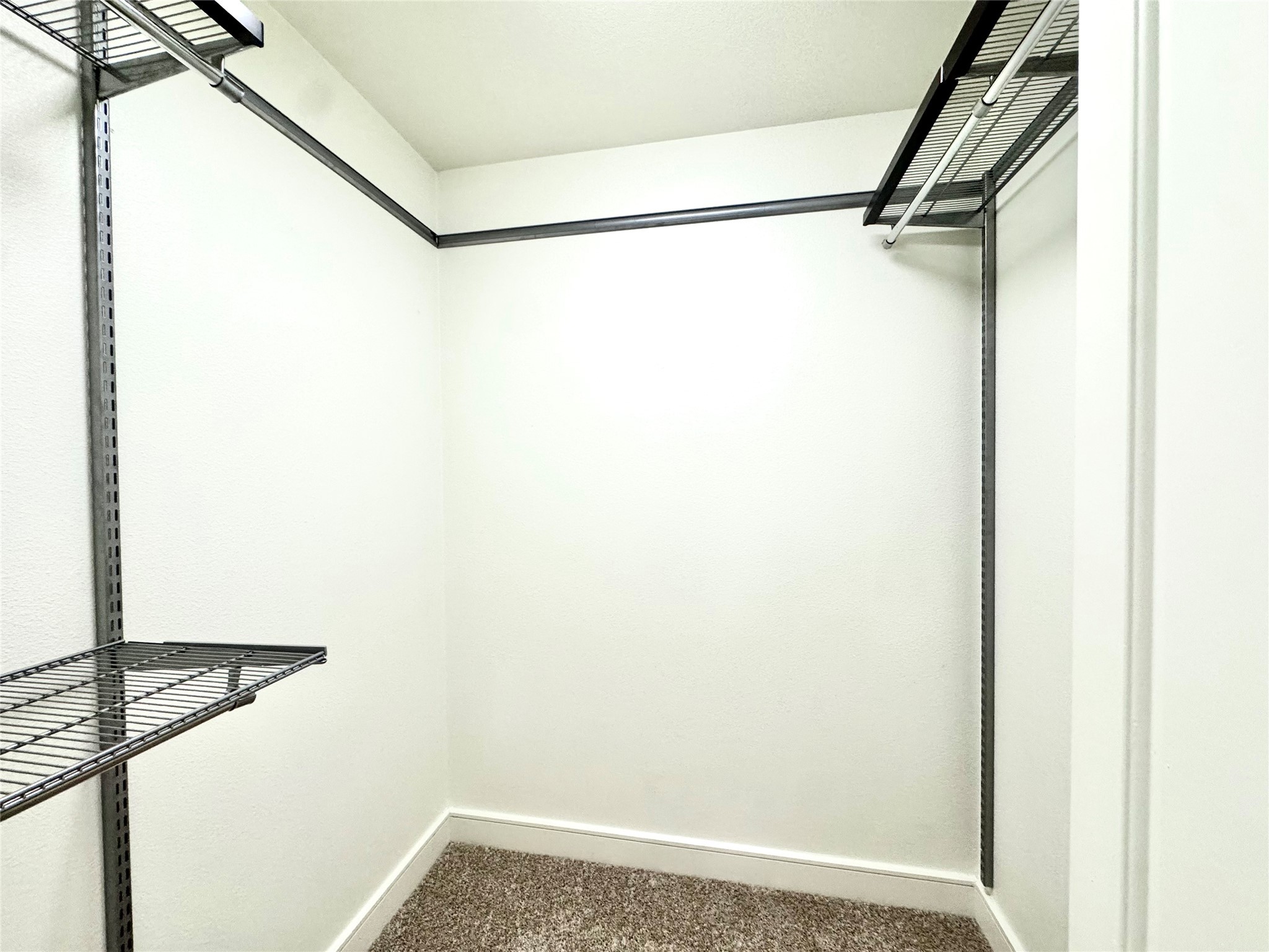 2303 Mid Lane, Unit 228 Houston, TX 77027 - Photo 17 of 30 a view of small space with racks on the wall