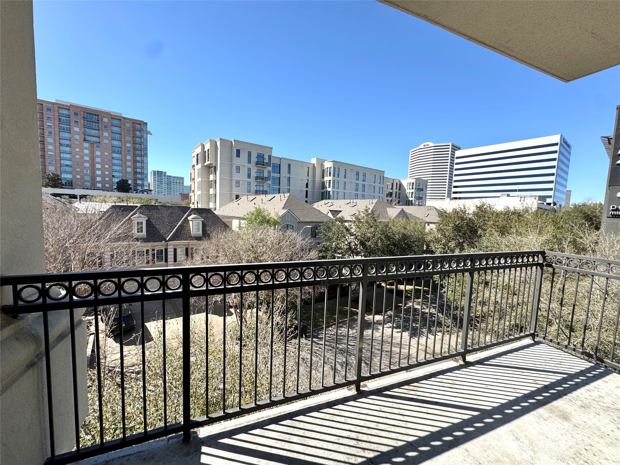 2303 Mid Lane, Unit 228 Houston, TX 77027 - Photo 7 of 30 a view of balcony with wooden floor