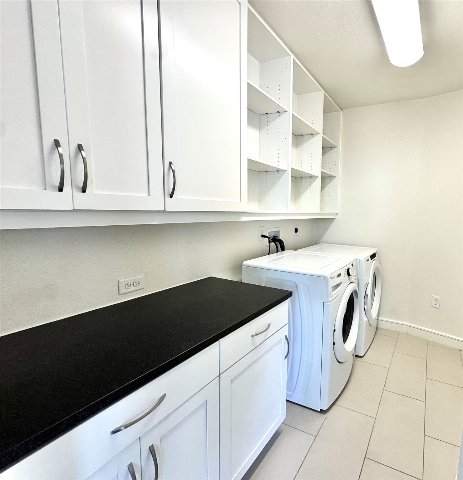 2303 Mid Lane, Unit 228 Houston, TX 77027 - Photo 8 of 30 a utility room with dryer and washer