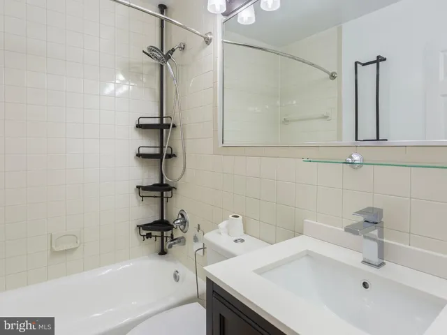 a bathroom with a sink and a tub
