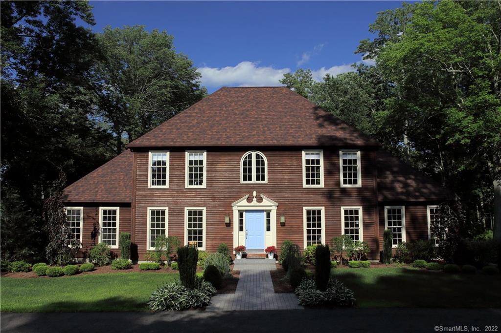 79 Anderson Road Pomfret, CT 06259 - Photo 1 of 1 front view of brick house with a yard