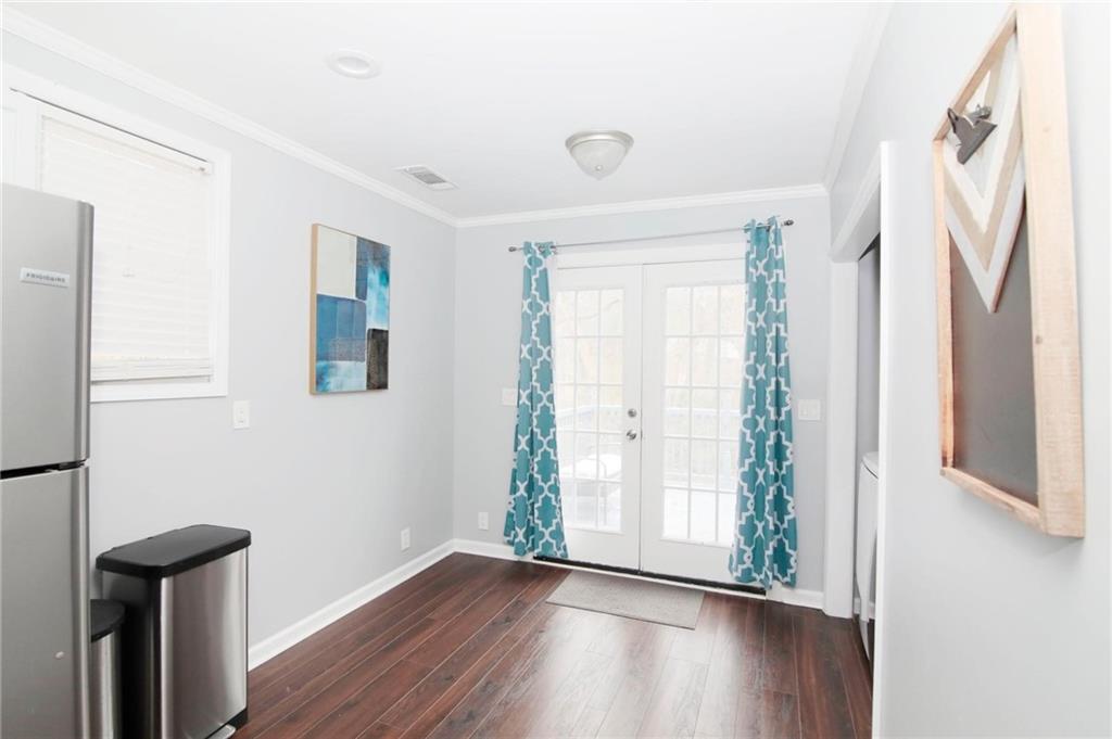 531 Allendale Drive Decatur, GA 30032 - Photo 11 of 19 an empty room with wooden floor and a window