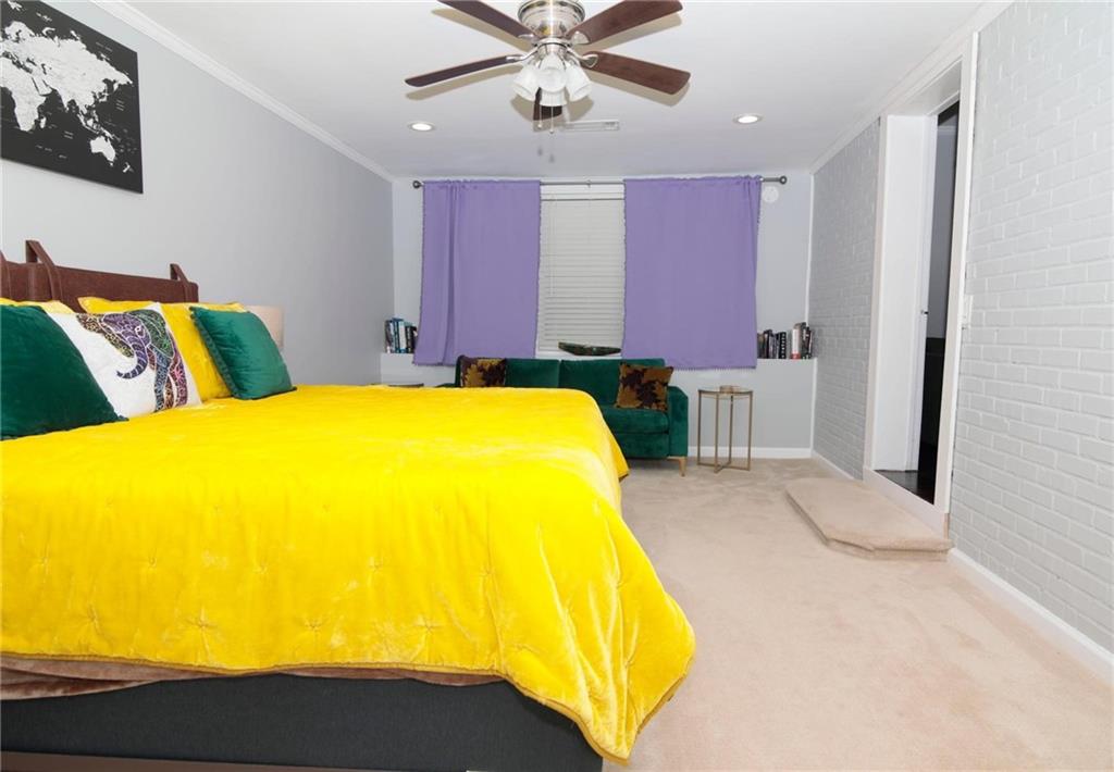 531 Allendale Drive Decatur, GA 30032 - Photo 12 of 19 a bed room with a bed and dresser