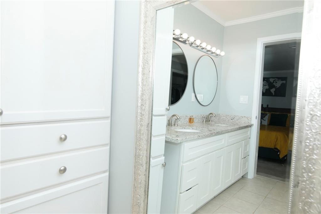 531 Allendale Drive Decatur, GA 30032 - Photo 13 of 19 a bathroom with a sink and a mirror