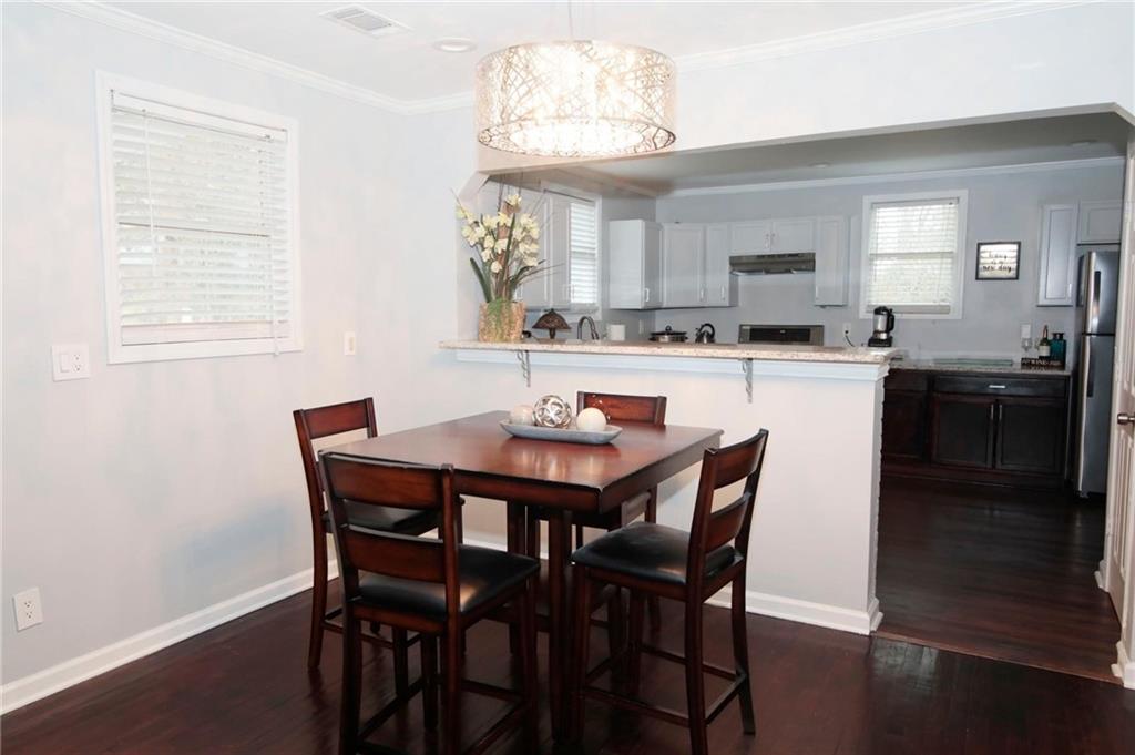 531 Allendale Drive Decatur, GA 30032 - Photo 8 of 19 a kitchen with a dining table and chairs