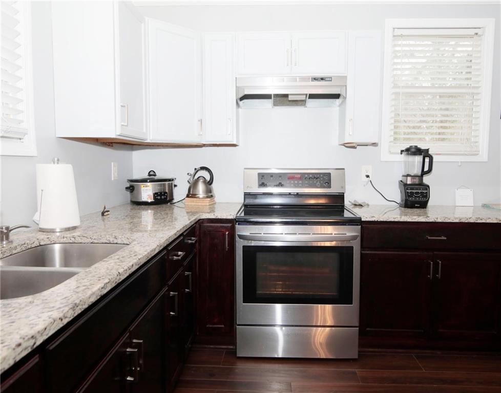 531 Allendale Drive Decatur, GA 30032 - Photo 10 of 19 a kitchen with stainless steel appliances granite countertop a sink and a stove