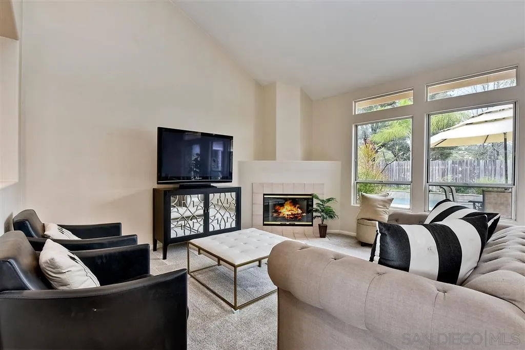 13603 Sunset View Road Poway, CA 92064 - Photo 3 of 25 a living room with furniture and a flat screen tv