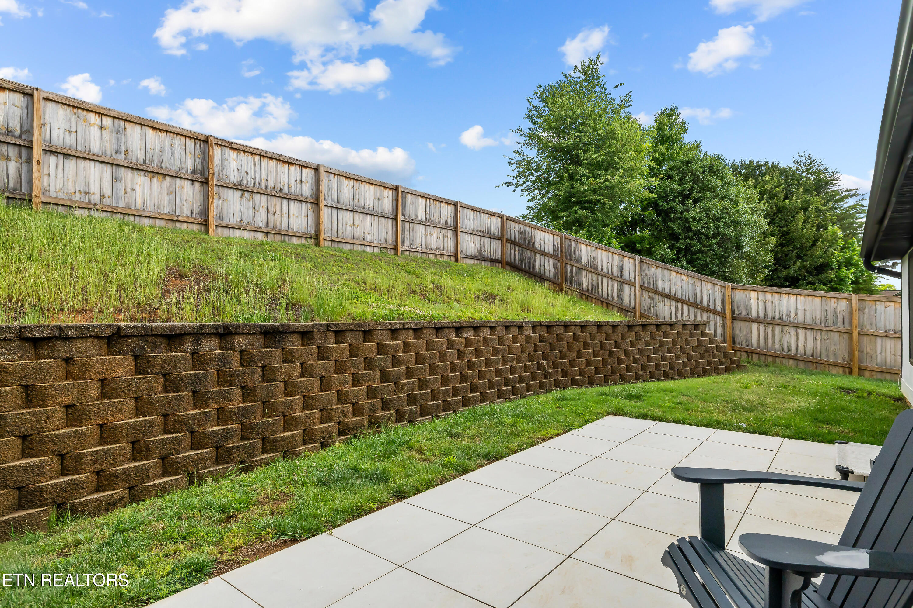 103 Rouen Court Maryville, TN 37801 - Photo 25 of 33 Back Yard - Retaining Wall