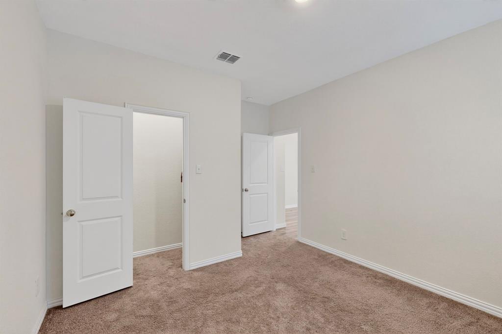 444 Ranchito Pass Fort Worth, TX 76052 - Photo 13 of 24 a view of an empty room