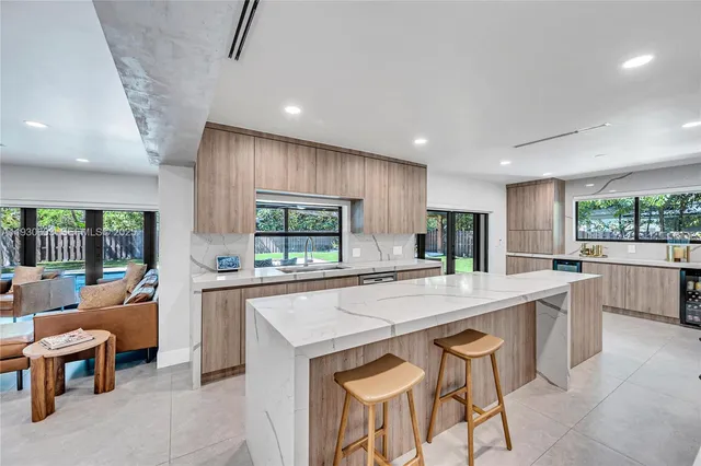 a kitchen that has a cabinets and a stove