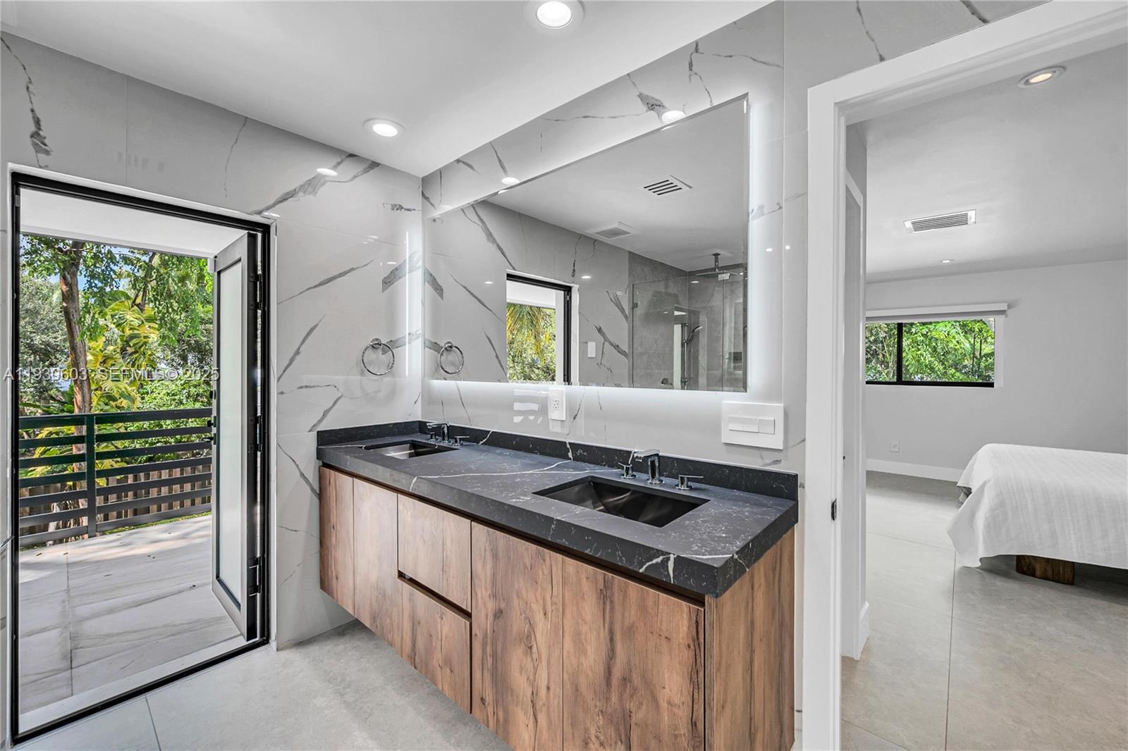 11340 Southwest 74th Court Pinecrest, FL 33156 - Photo 22 of 91 a kitchen that has a cabinets and a stove