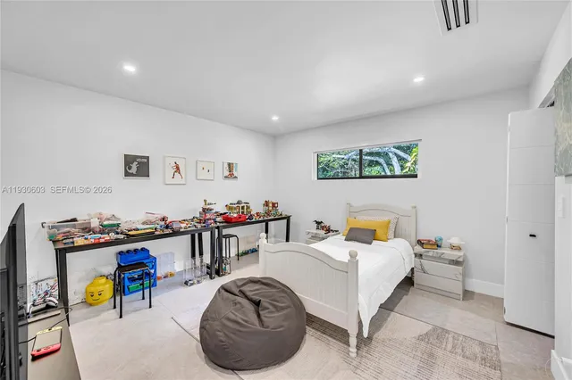 a view of a house with a yard porch and sitting area