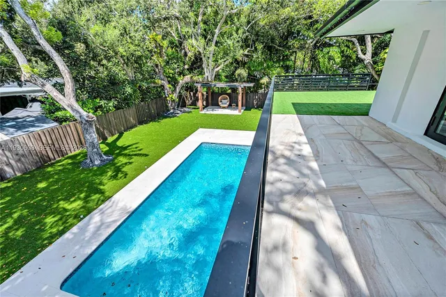 a view of a garden with a tree