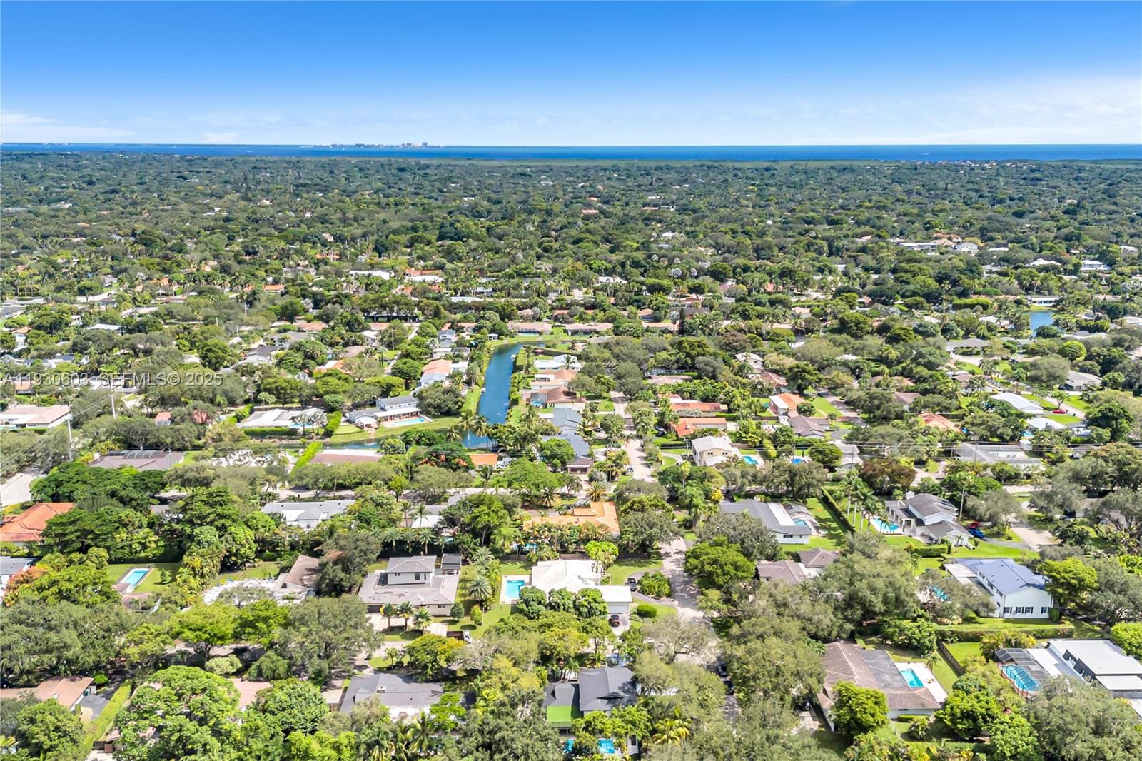 11340 Southwest 74th Court Pinecrest, FL 33156 - Photo 82 of 91 an aerial view of residential houses with city view