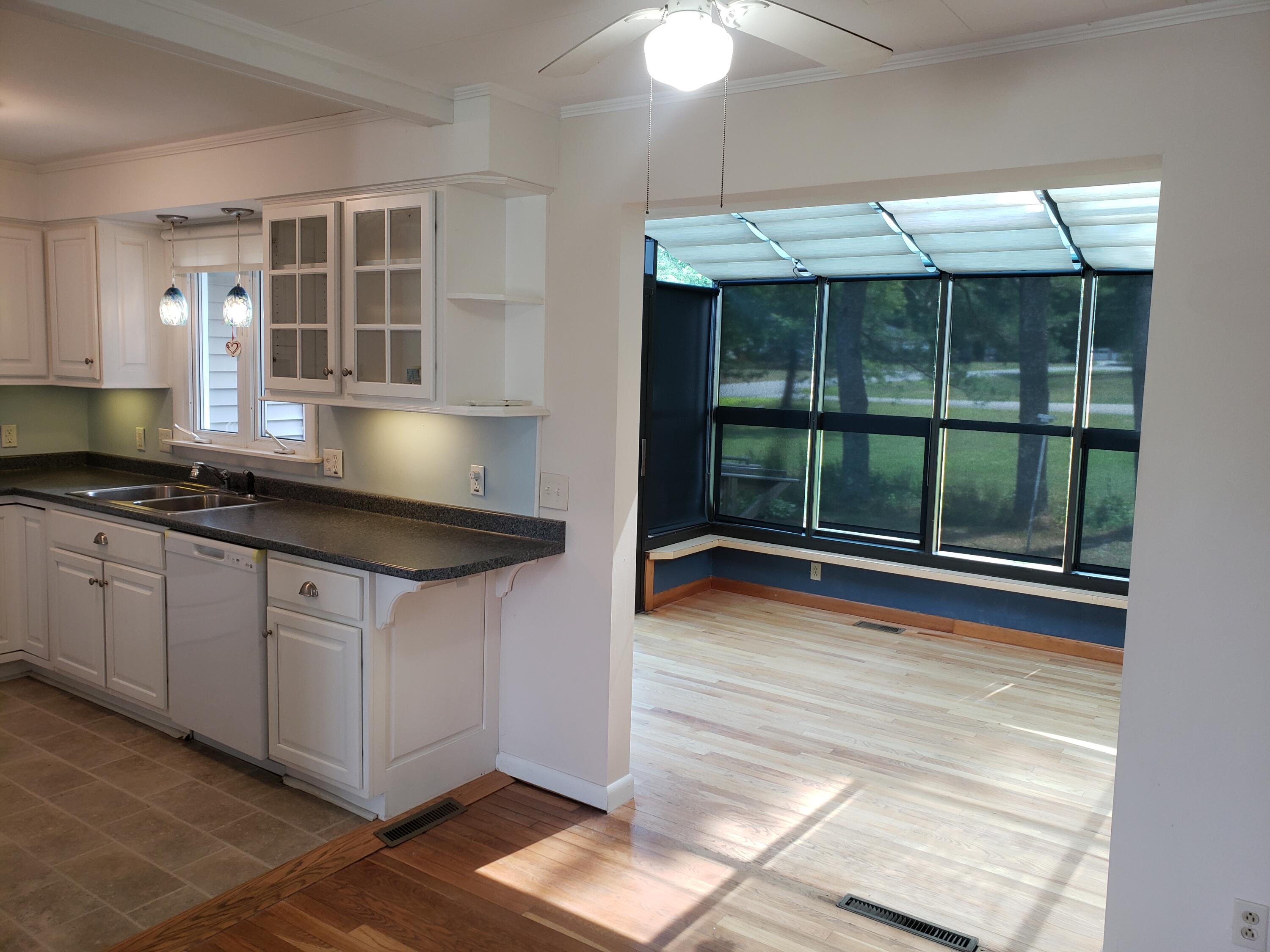 29 Perry Road Hampden, ME 04444 - Photo 10 of 44 Dining area to kitchen and sunroom
