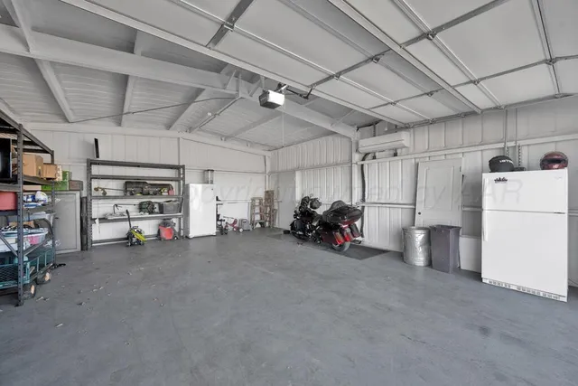 a view of a garage with storage