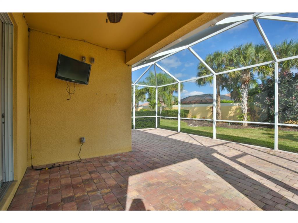19108 Lappacio Street Venice, FL 34293 - Photo 24 of 33 a view of an empty room with floor to ceiling windows