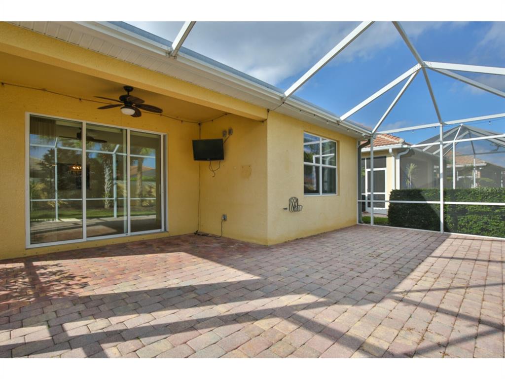 19108 Lappacio Street Venice, FL 34293 - Photo 26 of 33 a view of a house with a backyard
