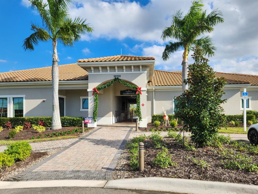 19108 Lappacio Street Venice, FL 34293 - Photo 28 of 33 a front view of a house with a porch