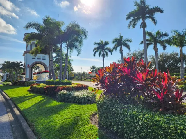 a view of a backyard with swimming pool