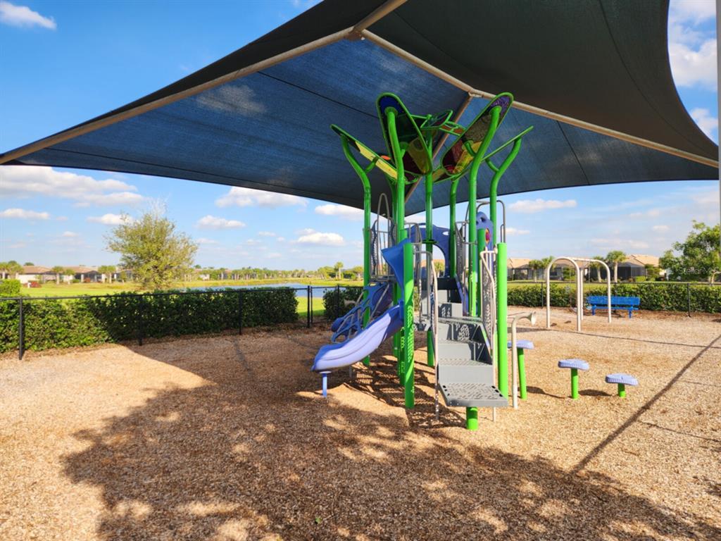 19108 Lappacio Street Venice, FL 34293 - Photo 31 of 33 a view of a park with a slide