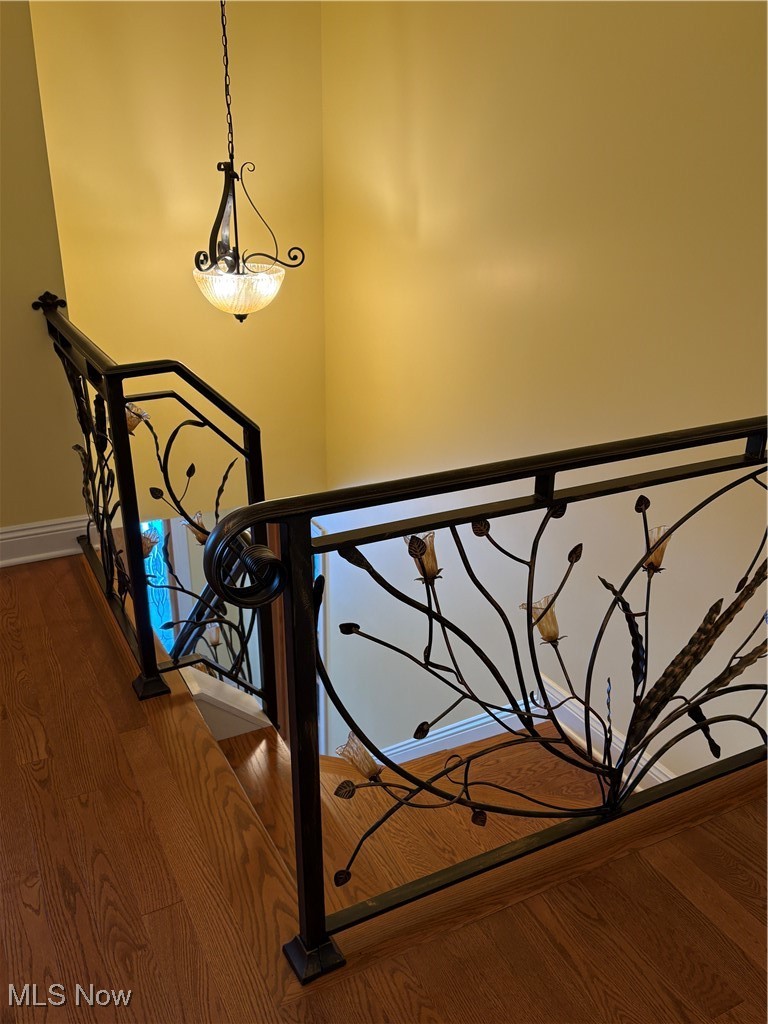 2504 Meloy Road Kent, OH 44240 - Photo 40 of 50 Stairway with hardwood wood flooring and custom railing