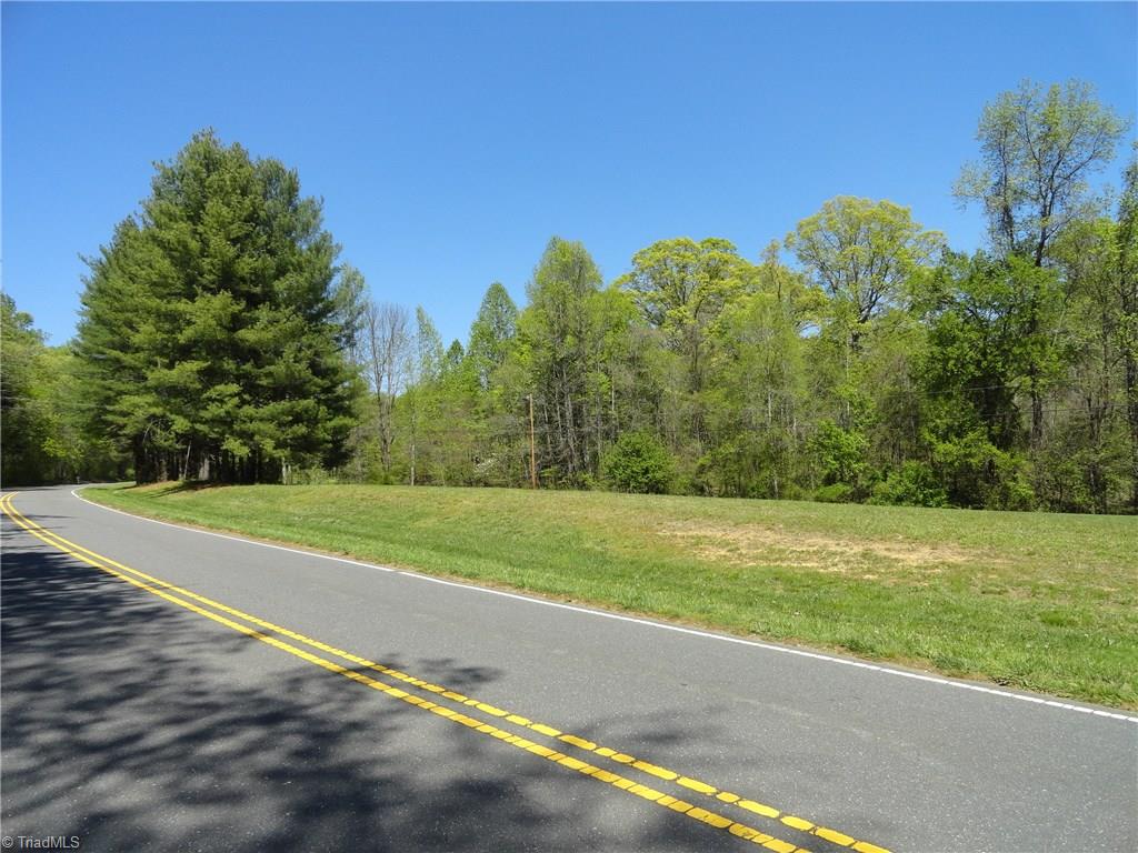 View of road frontage, nice size field that has been cleared