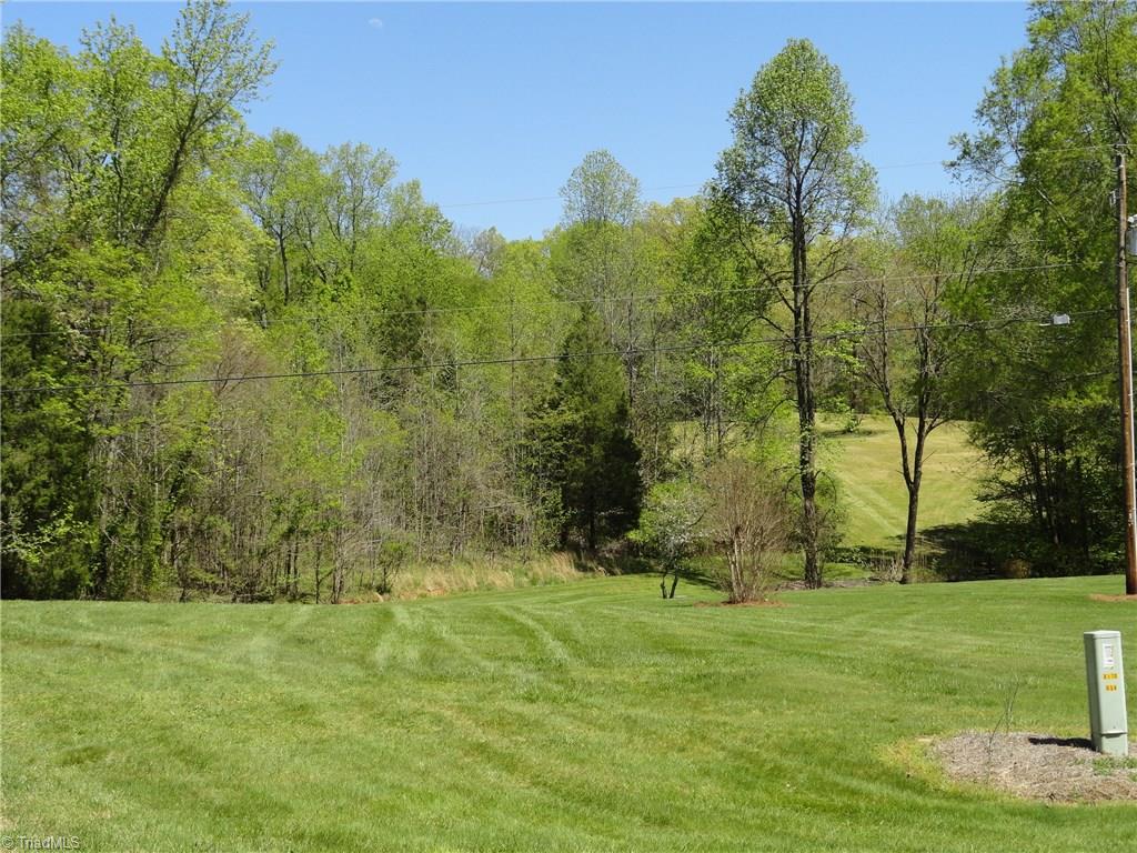 From road frontage land meanders up and to the right of photo.