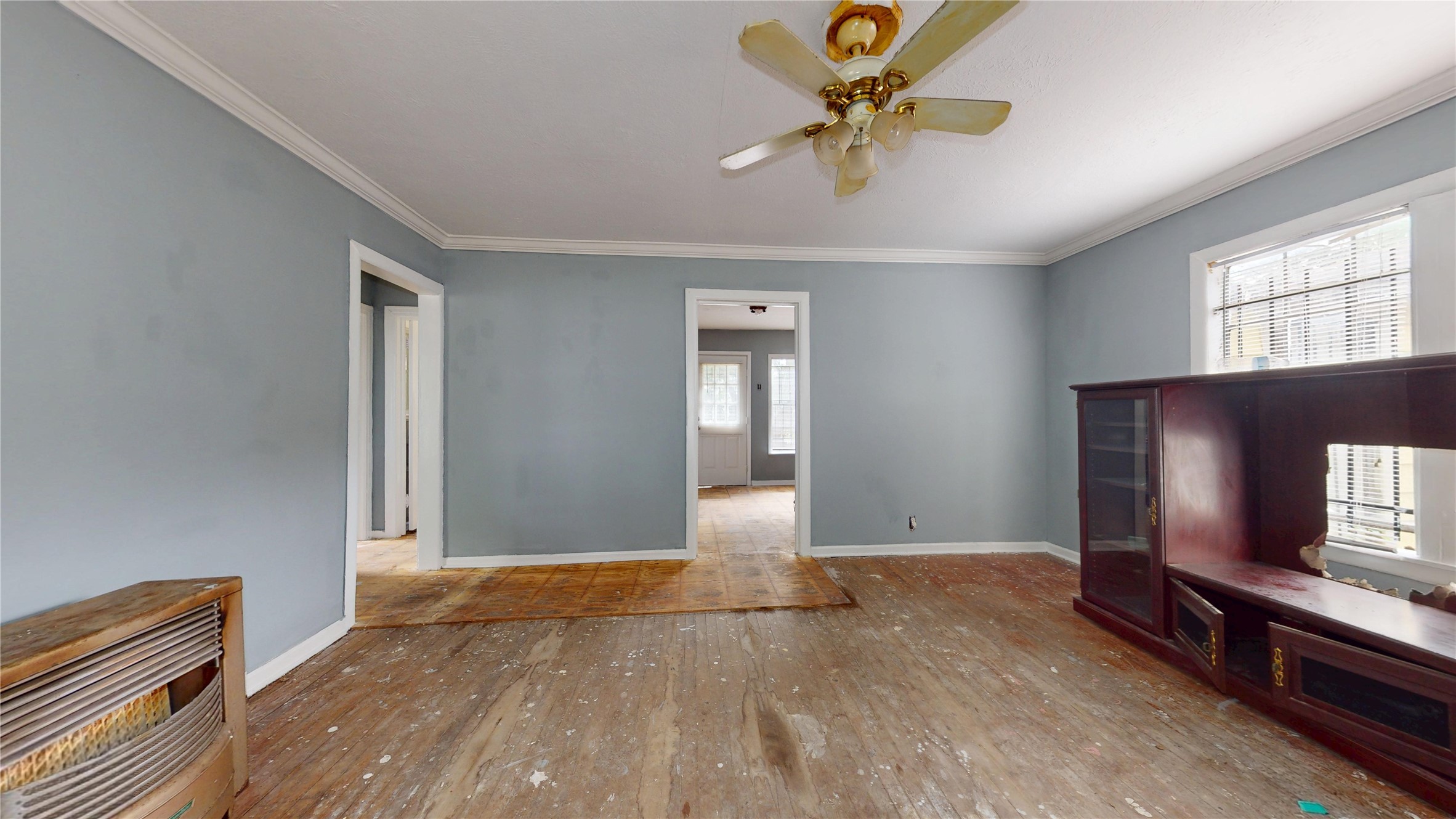 6604 Conley Street Houston, TX 77021 - Photo 6 of 28 wooden floor in an empty room with a window