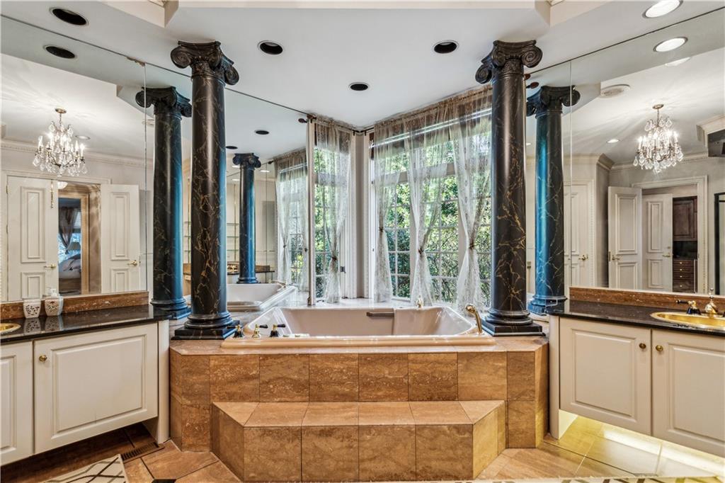 712 West Paces Ferry Road Northwest Atlanta, GA 30327 - Photo 20 of 26 a living room with large window and furniture