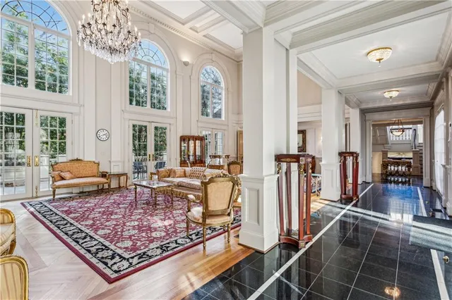 a living room with furniture and a rug