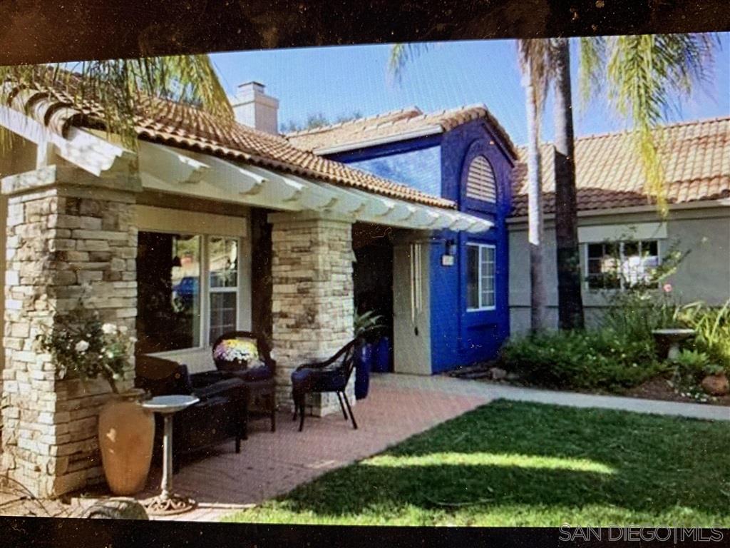 a front view of a house with a porch