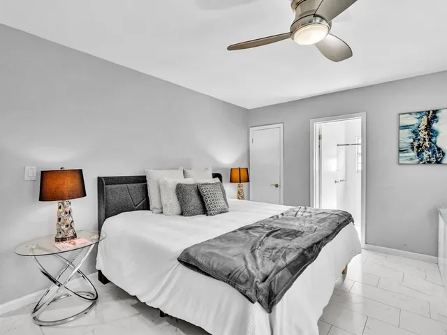 a view of a chairs and table in the patio