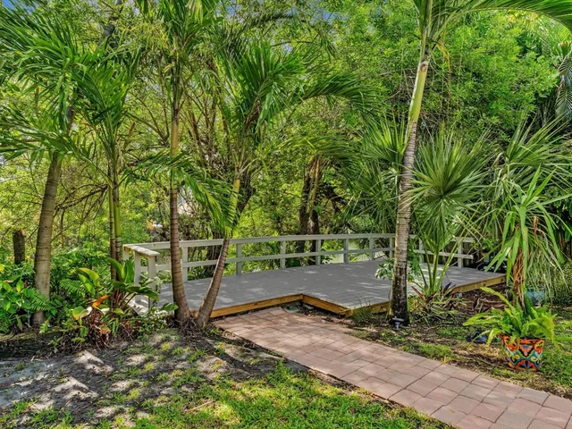 a house with trees in front of it