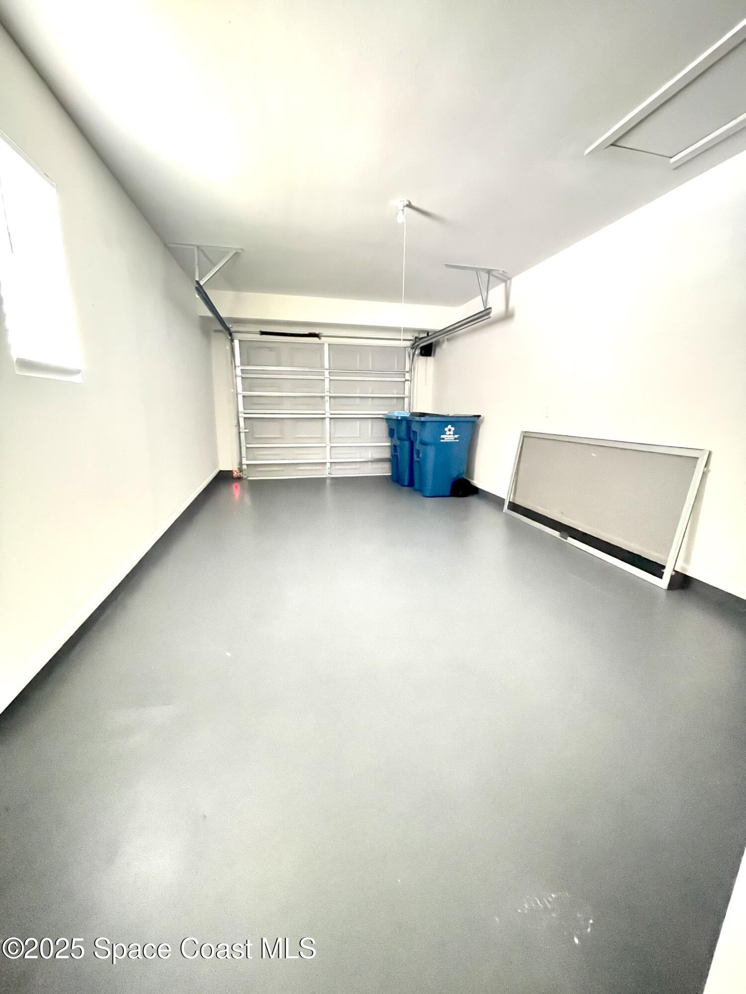 1186 Galty Circle Northeast, Unit 6 Palm Bay, FL 32905 - Photo 23 of 26 a view of room with stairs and white walls