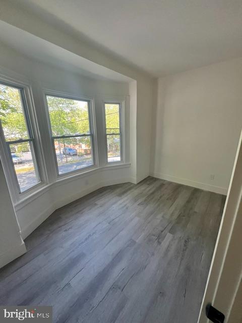17 State Hill Road Wyomissing, PA 19610 - Photo 11 of 15 a view of an empty room with wooden floor and a window