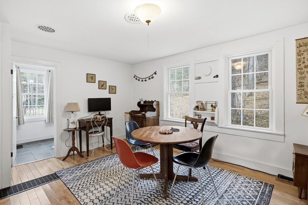 118 North Leverett Road Leverett, MA 01054 - Photo 12 of 26 a view of a livingroom with furniture and a window