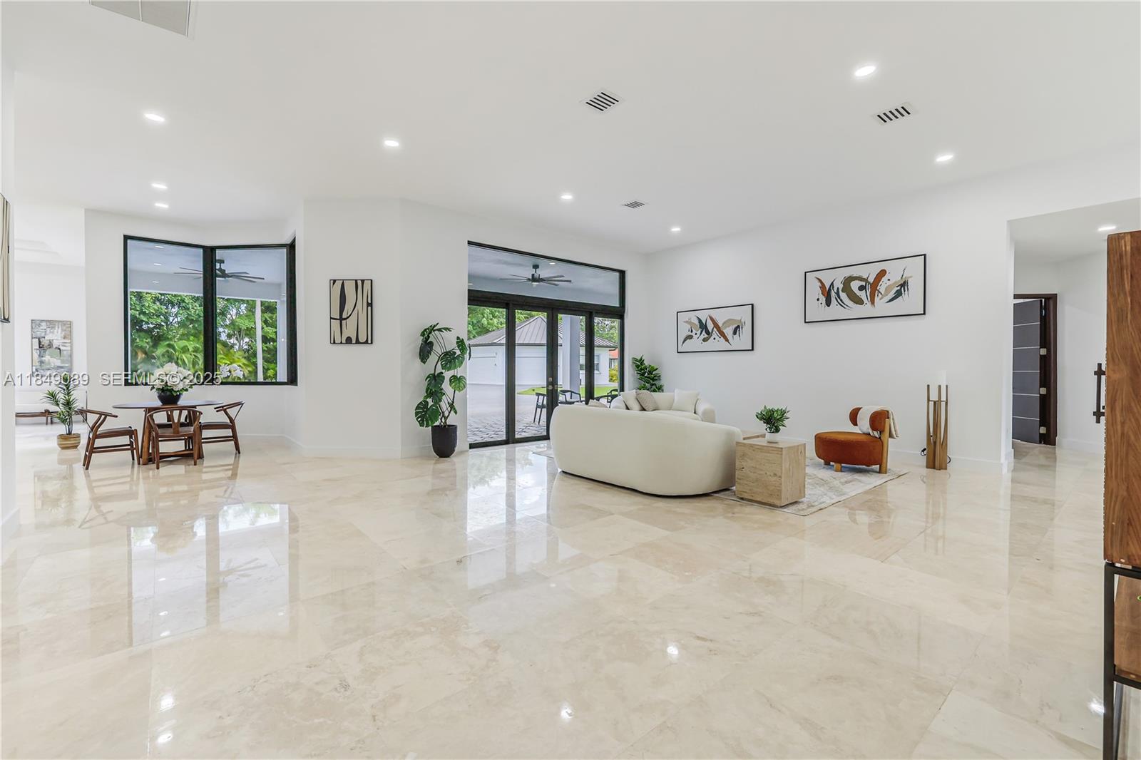601 Ranch Road Weston, FL 33326 - Photo 15 of 75 Elegant travertine floors throughout the main residence.