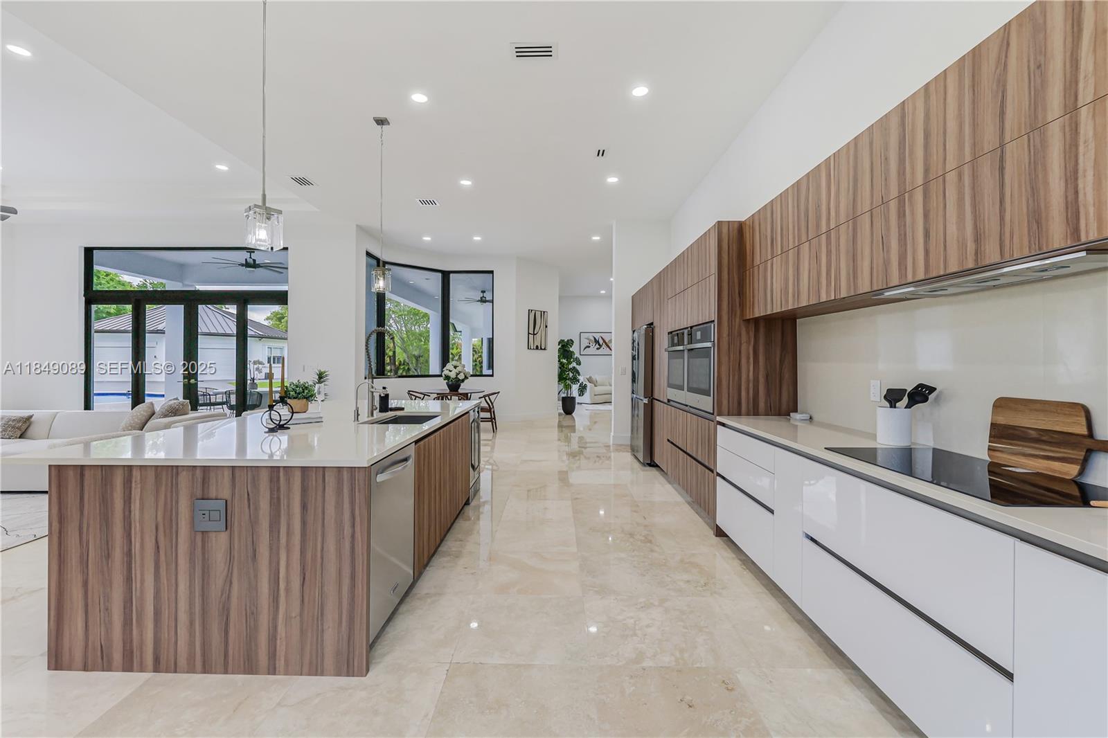 601 Ranch Road Weston, FL 33326 - Photo 16 of 75 Designer chef’s kitchen with top-of-the-line appliances